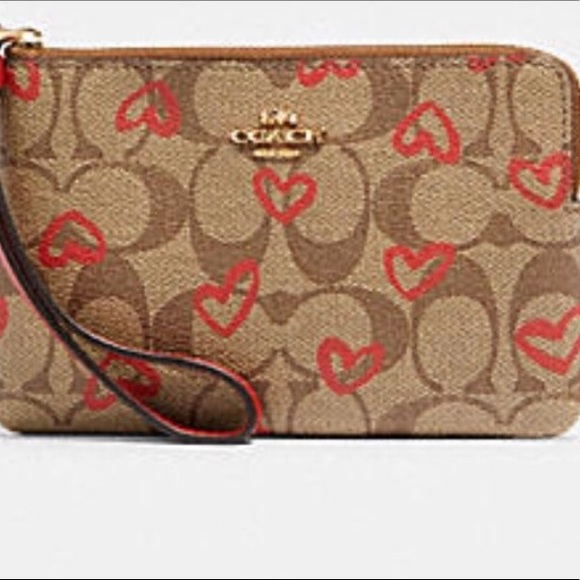 Coach Handbags - ❤️❤️❤️CORNER ZIP WRISTLET IN SIGNATURE CANVAS WITH ❤️❤️❤️